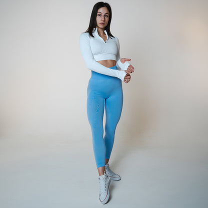 Lavi Harmony Collection - Hellblaue, glatte Leggings mit hohem, V-förmigem Bund über dem Gesäß