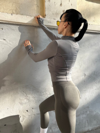 Long rashguard with zipper from the Lavi Gym collection. (Grey)